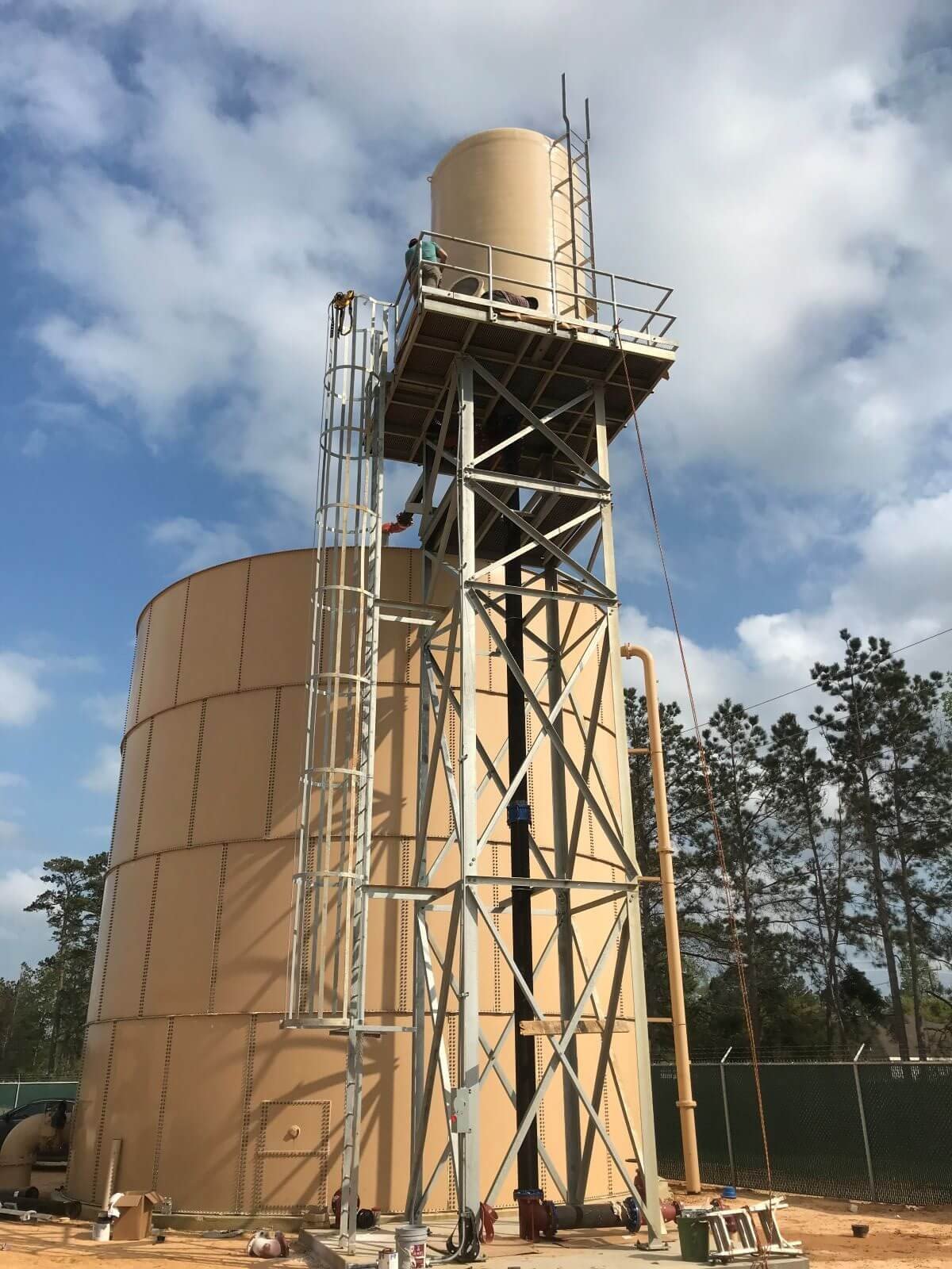 WETS aerator on a galvanized tower above a bolted storage tank