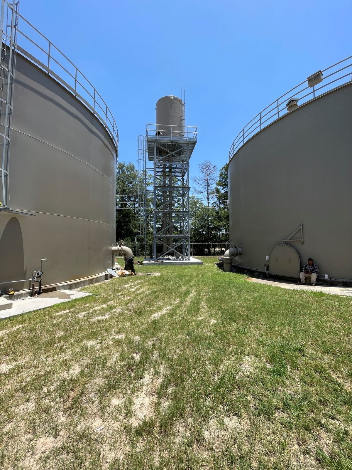 WETS aerator tower between two ground storage tanks