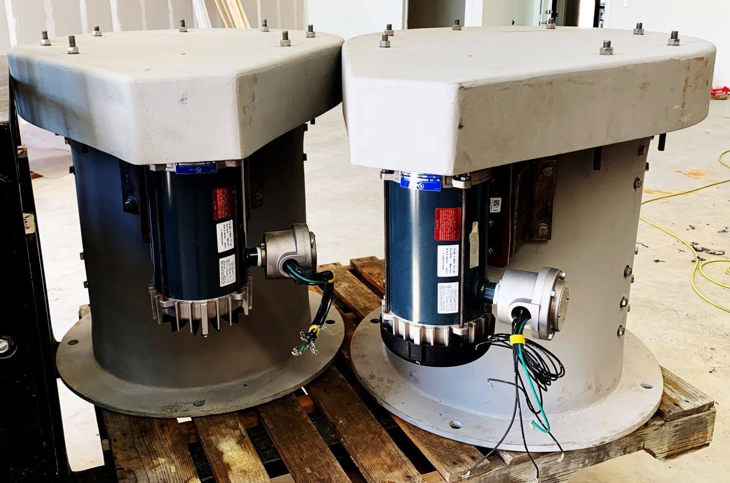 Two WETS ventilation units in the shop prior to installation