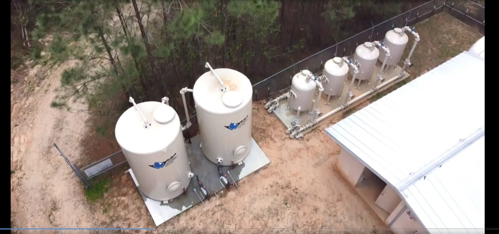 Aerial view of a WETS plant: storage vessels alongside a bank of pressure filters