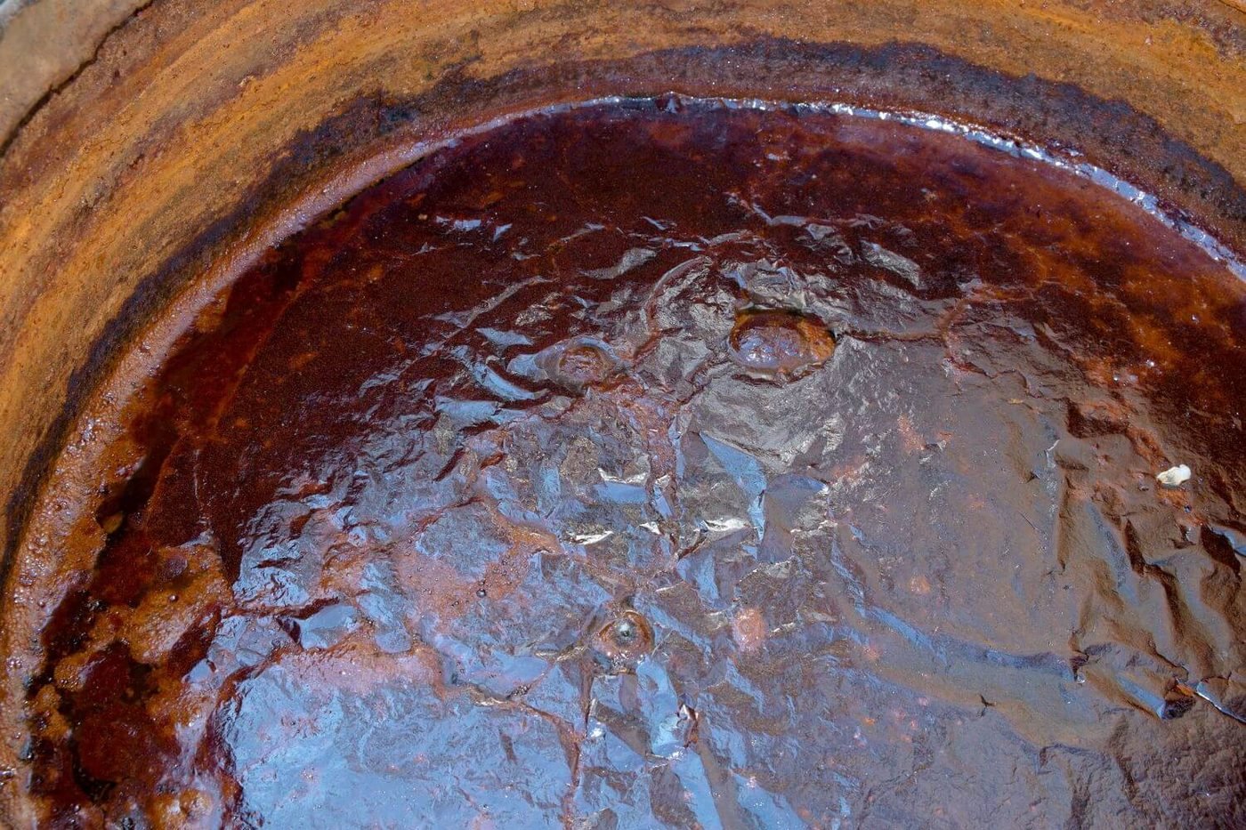 Heavy mineral scale and rust built up inside a water tank